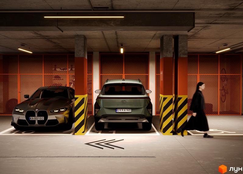 Підземний паркінг в ЖК SOUL PARK з двома автомобілями та пішохідною зоною. Паркінг має бетонну стелю, колони з жовто-чорними смугами та помаранчеві сітчасті огорожі.