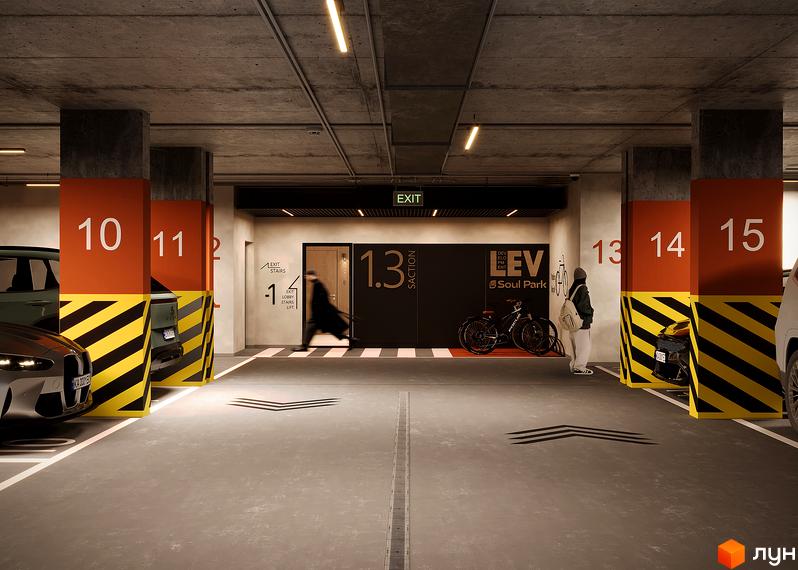 Підземний паркінг житлового комплексу SOUL PARK з пронумерованими місцями та велосипедною зоною. Паркінг має бетонні колони з оранжевими та чорно-жовтими смугами.