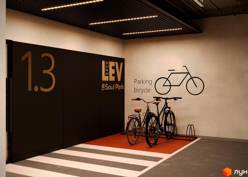 Паркінг для велосипедів у житловому комплексі SOUL PARK. На стіні зображення велосипеда та напис 