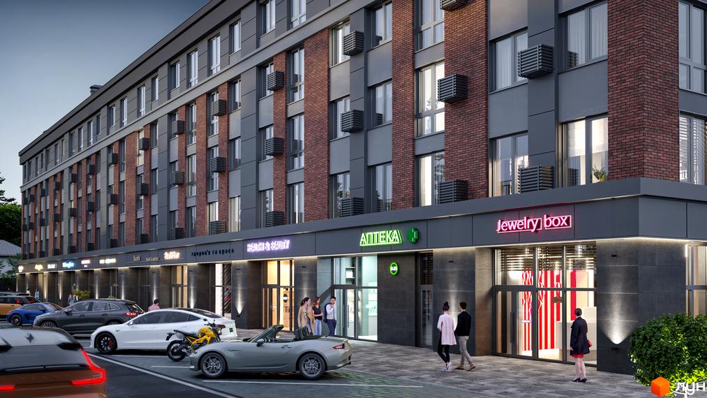 Зовнішній вигляд житлового комплексу Kvartal Soborna з фасадами з цегли та сірого металу, вікнами та кондиціонерами. На першому поверсі розташовані магазини та аптека, перед будинком припарковані автомобілі.