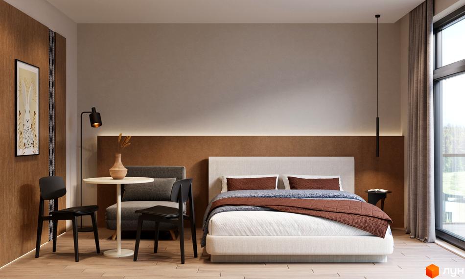 Інтер'єр спальні в новобудові MÓNTES invest & resort з ліжком, кріслом та столом. Вікно з видом на зелену зону.