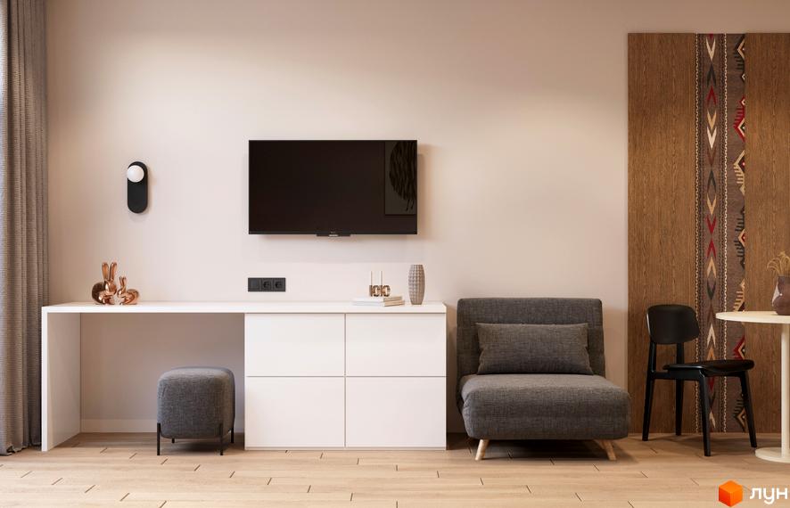 Інтер'єр вітальні з диваном, кріслом та телевізором. MÓNTES invest & resort – новобудова для комфортного життя.