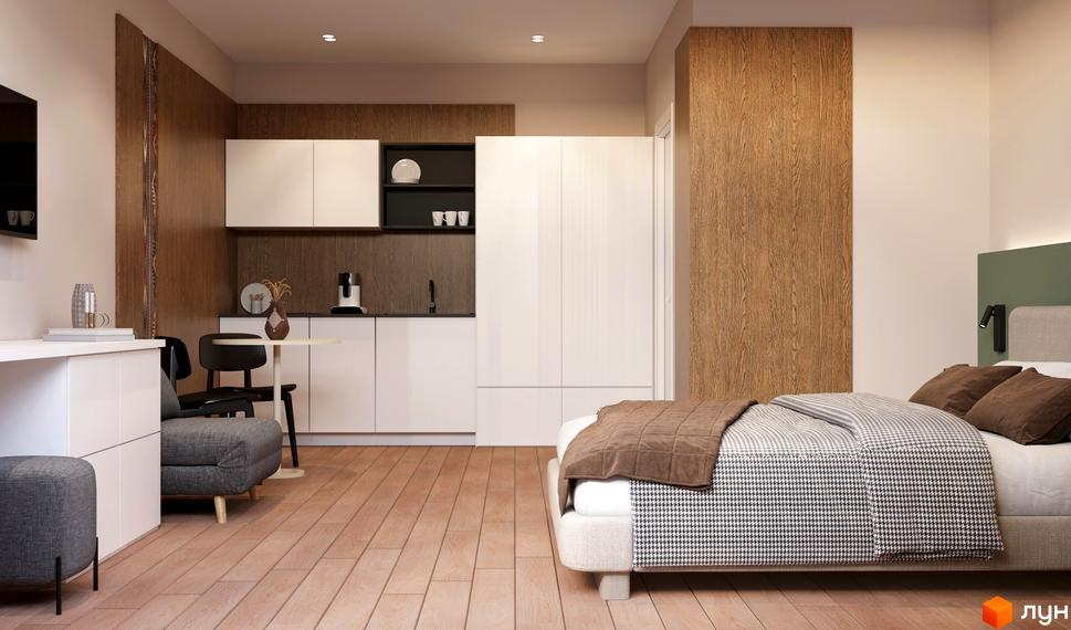 Інтер'єр студії в MÓNTES invest & resort з міні-кухнею, обідньою зоною та ліжком. Сучасний дизайн та функціональне планування.