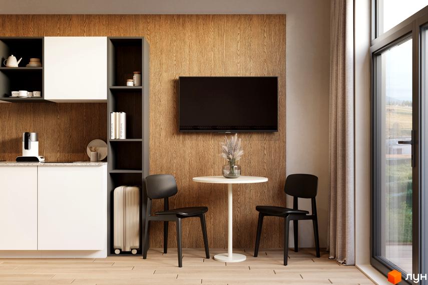 Інтер'єр квартири в MÓNTES invest & resort з кухонною зоною, обіднім столом та телевізором на стіні. Простора кімната з великим вікном та видом на зелену зону.