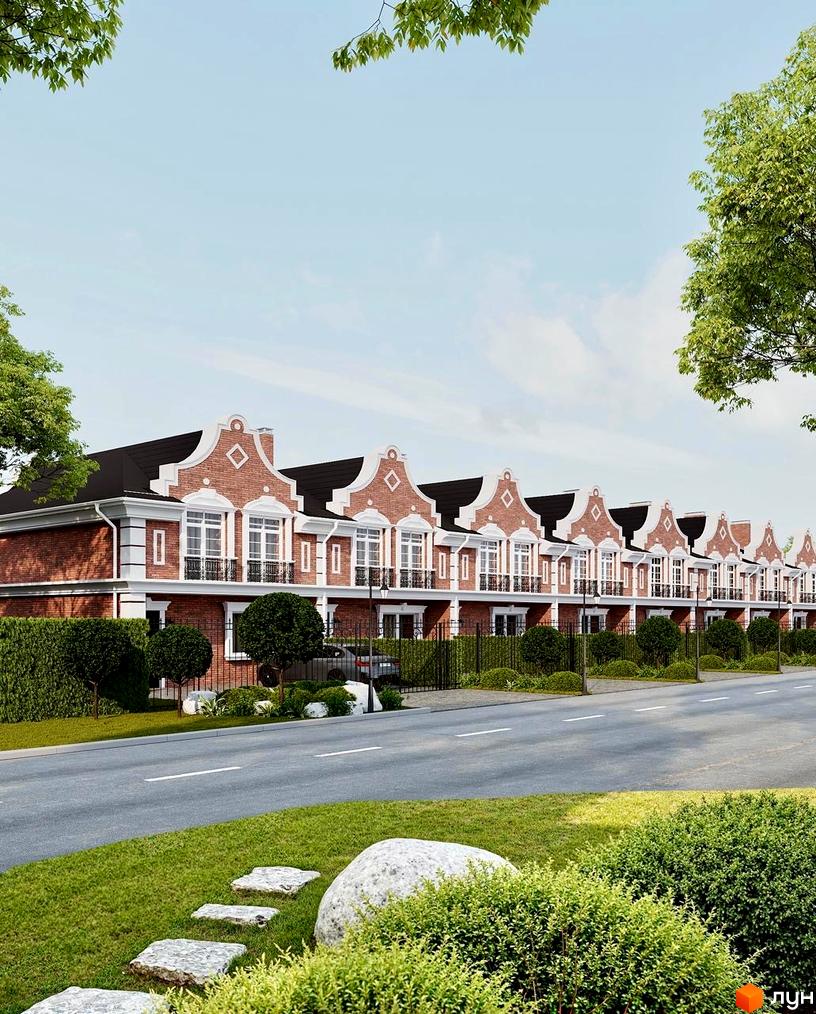 Таунхауси Cambridge Town з червоної цегли з білими вікнами та балконами, розташовані вздовж дороги з доглянутою прибудинковою територією.