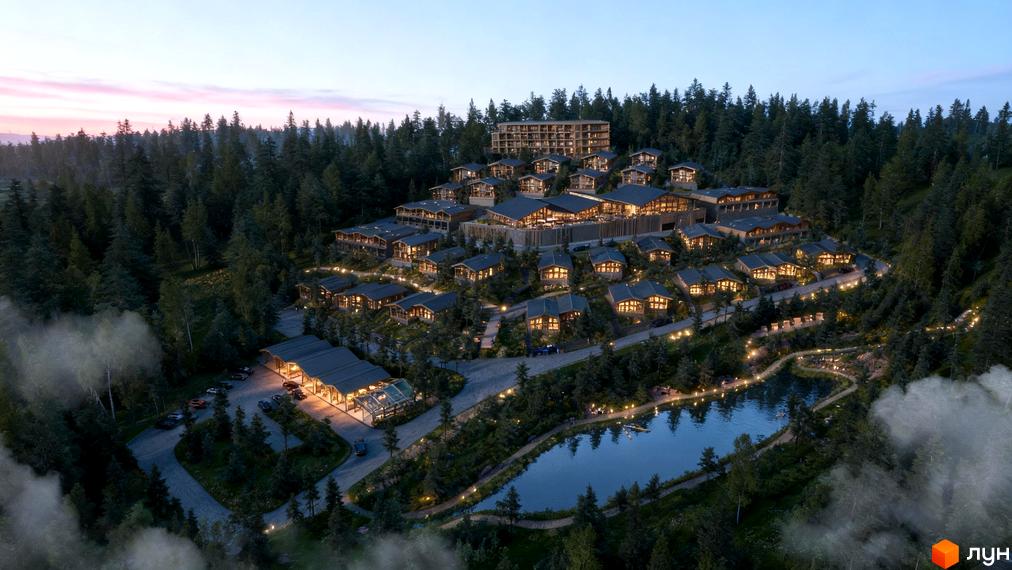 Котеджне містечко Chamonix Premier Resort з дерев'яними будиночками на схилі гори біля озера. На території є парковка та головна будівля.