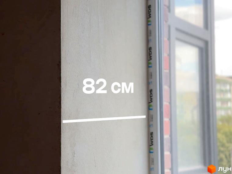 Вимірювання відкосу вікна в житловому комплексі Стандарт. Зовнішній вигляд фасаду новобудови.