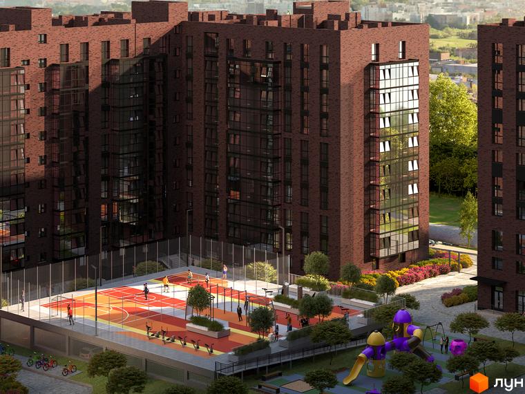 Житловий комплекс Стандарт: цегляні багатоповерхівки з панорамним склінням та облаштований двір зі спортивним майданчиком та дитячою зоною.