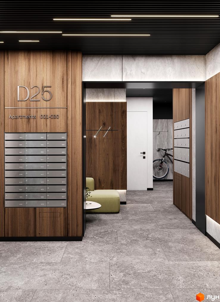 Житловий комплекс D25: вхідна група з дерев'яними панелями та поштовими скриньками, сіра плитка на підлозі та стінах, велосипед.