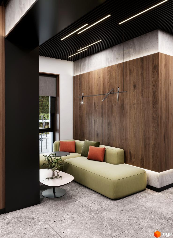 Інтер'єр зони відпочинку в ЖК D25 з диваном та кавовим столиком. Сучасний дизайн інтер'єру новобудови.