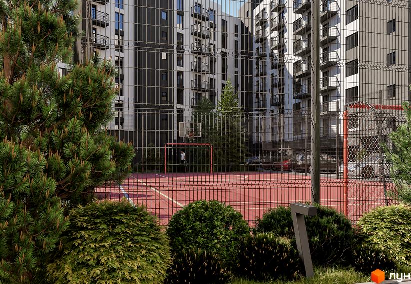 Житловий комплекс Урожайний: сучасна архітектура будівель та спортивний майданчик з баскетбольним кільцем та футбольними воротами.