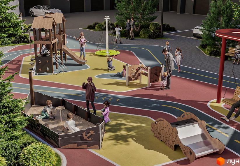 Дитячий майданчик біля житлового комплексу Урожайний з гірками, пісочницею та гойдалками. На території граються діти, а поруч розташовані дерева та парковка.