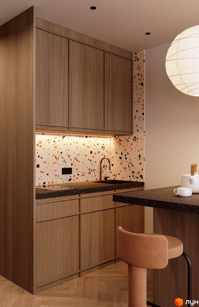 Інтер'єр кухні в новобудові Standard One Позняки з дерев'яними фасадами, яскравим фартухом та барною стійкою. Сучасний дизайн кухні в житловому комплексі.