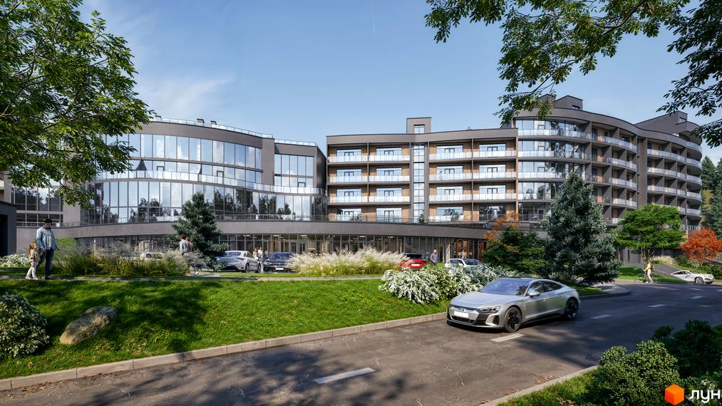 Апарт-комплекс PHOENIX MEDICAL RESORT з панорамними вікнами та балконами, оточений доглянутою прибудинковою територією з деревами та парковкою.