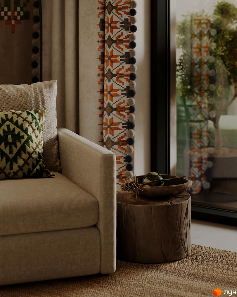 Апарт-комплекс PHOENIX MEDICAL RESORT. Інтер'єр вітальні з диваном, декоративними подушками та тумбою з декором.