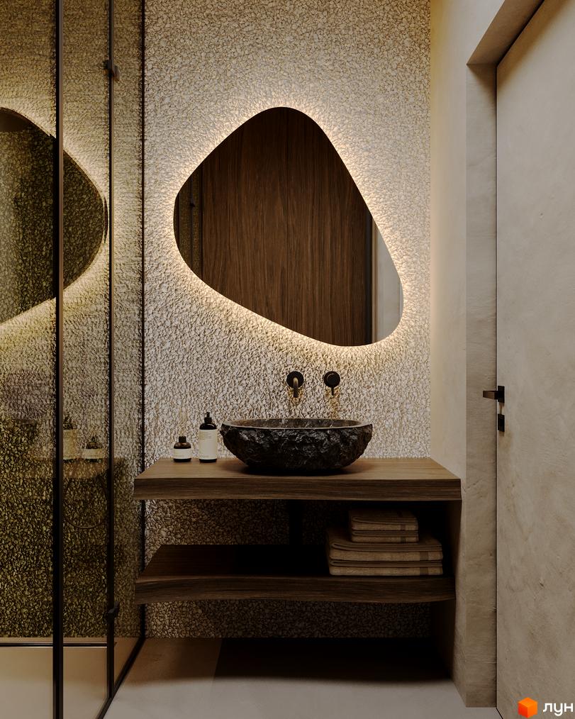 Сучасний дизайн ванної кімнати з кам'яною раковиною та підсвічуванням дзеркала. Апарт-комплекс PHOENIX MEDICAL RESORT.