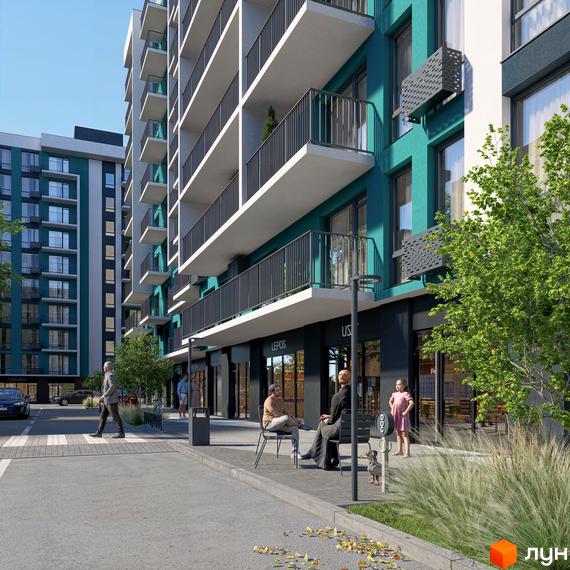 Житловий комплекс URBN з фасадами бірюзового кольору та білими балконами. Прибудинкова територія з магазинами та місцями для відпочинку.