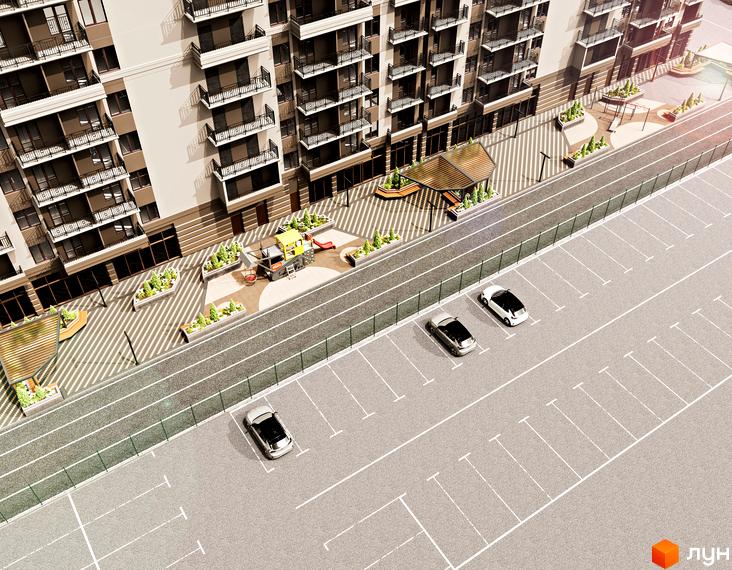 Висотна будівля ЖК Еллада з балконами та терасами, поруч з паркінгом. На території є дитячий майданчик та зелені насадження.