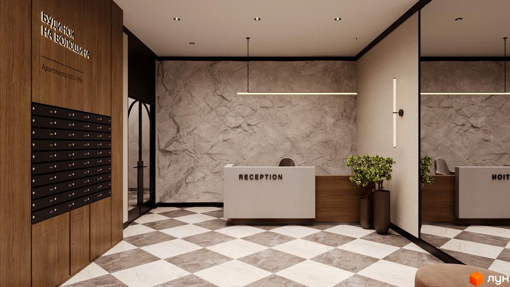 Інтер'єр холу в ЖК Будинок на Волошина. Стіни оздоблені декоративним каменем, підлога з плиткою у шаховому порядку, стійка рецепції.