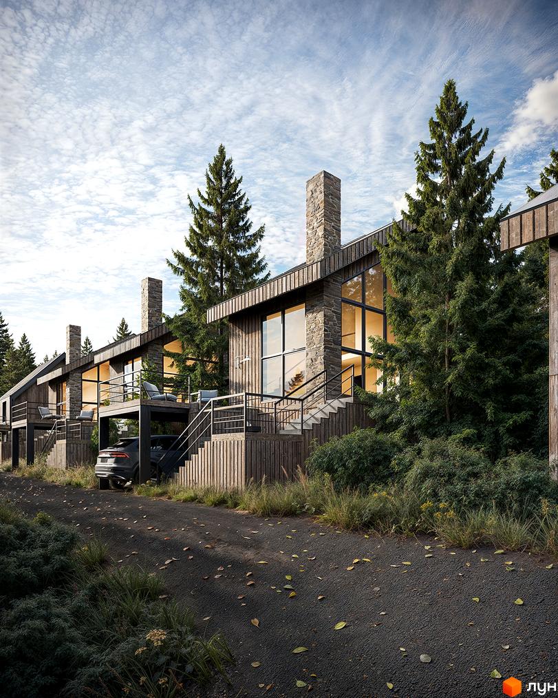Зображення житлового комплексу з дерев'яним оздобленням та кам'яними димарями. На території росте багато зелені, є парковка для авто.