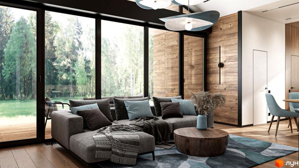 Вітальня в будинку з великими вікнами, диваном та килимом. КМ Bucha Village - продаж квартир в новобудовах з видом на природу.