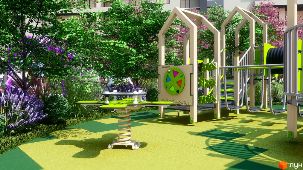Фасад новобудови GARDEN CITY за деревами. Дитячий майданчик з ігровими елементами та зеленими насадженнями.