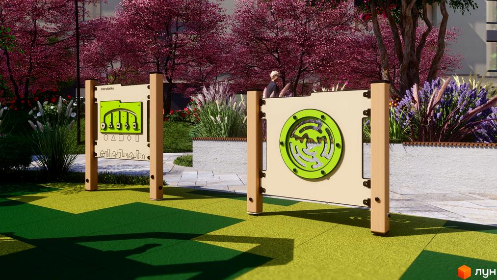 Ігровий майданчик Житлового комплексу GARDEN CITY з інтерактивними панелями. Територія має квітучі дерева та доглянуте озеленення.