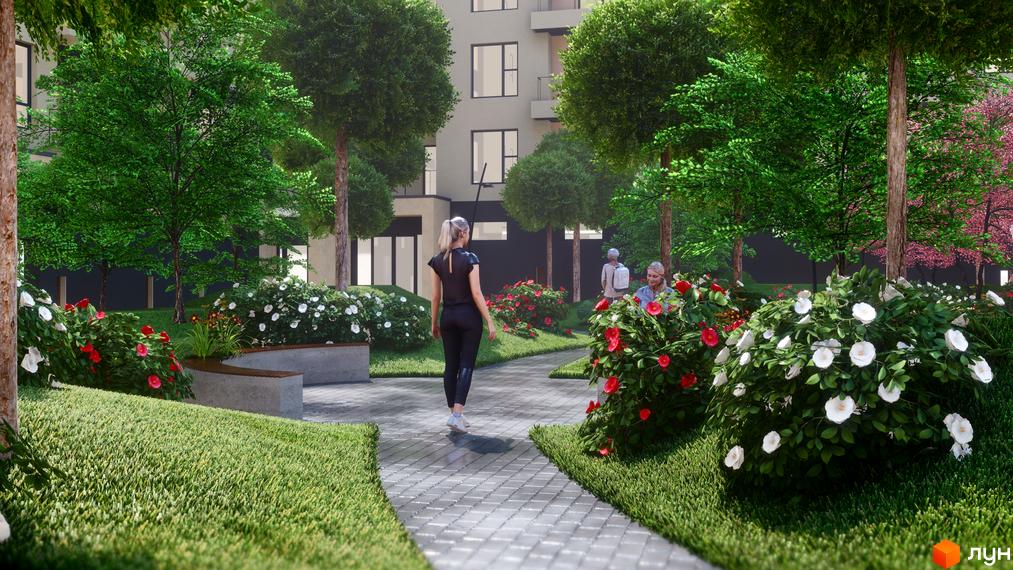Багатоповерховий будинок Житлового комплексу GARDEN CITY з світлим фасадом, оточений зеленими насадженнями, квітами та пішохідними доріжками.