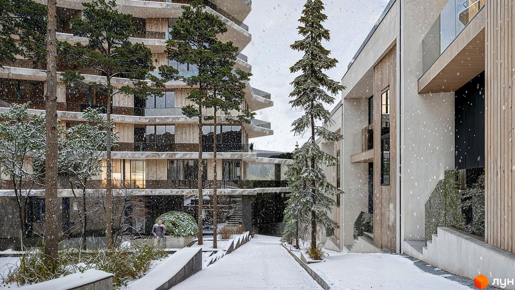 ZAGRAVA Villas & Residence: світлі будівлі з вигнутими балконами та дерев'яними вставками. Територія вкрита снігом, з хвойними деревами.