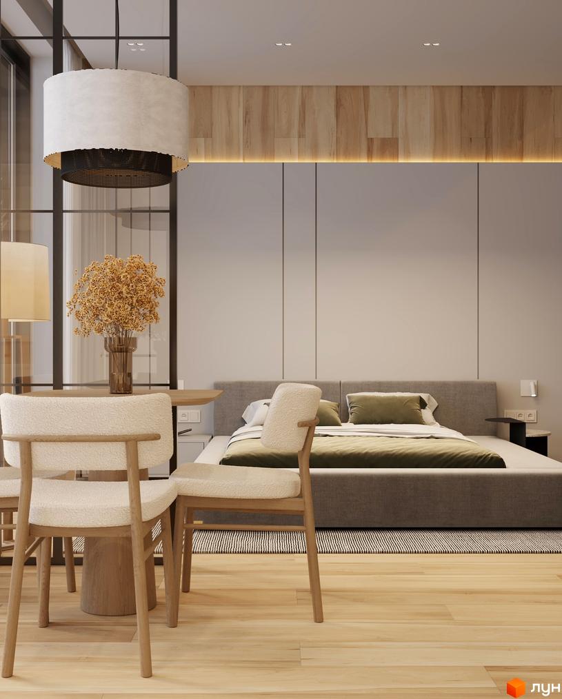 Світла спальня з дерев'яною підлогою, ліжком з сірим узголів'ям, столом та стільцями. Інтер'єр ZAGRAVA Villas & Residence з функціональним зонуванням.