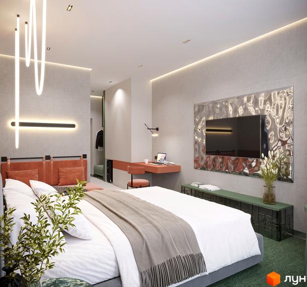 Спальня в Апарт-комплекс KARDAMON RESORT & SPA з ліжком, помаранчевим узголів'ям, робочим місцем та телевізором. Світлі стіни та зелений килим доповнюють інтер'єр.