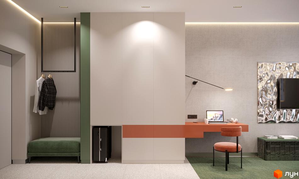 Інтер'єр апартаментів Апарт-комплексу KARDAMON RESORT & SPA з робочою зоною, шафою та зоною для відпочинку.