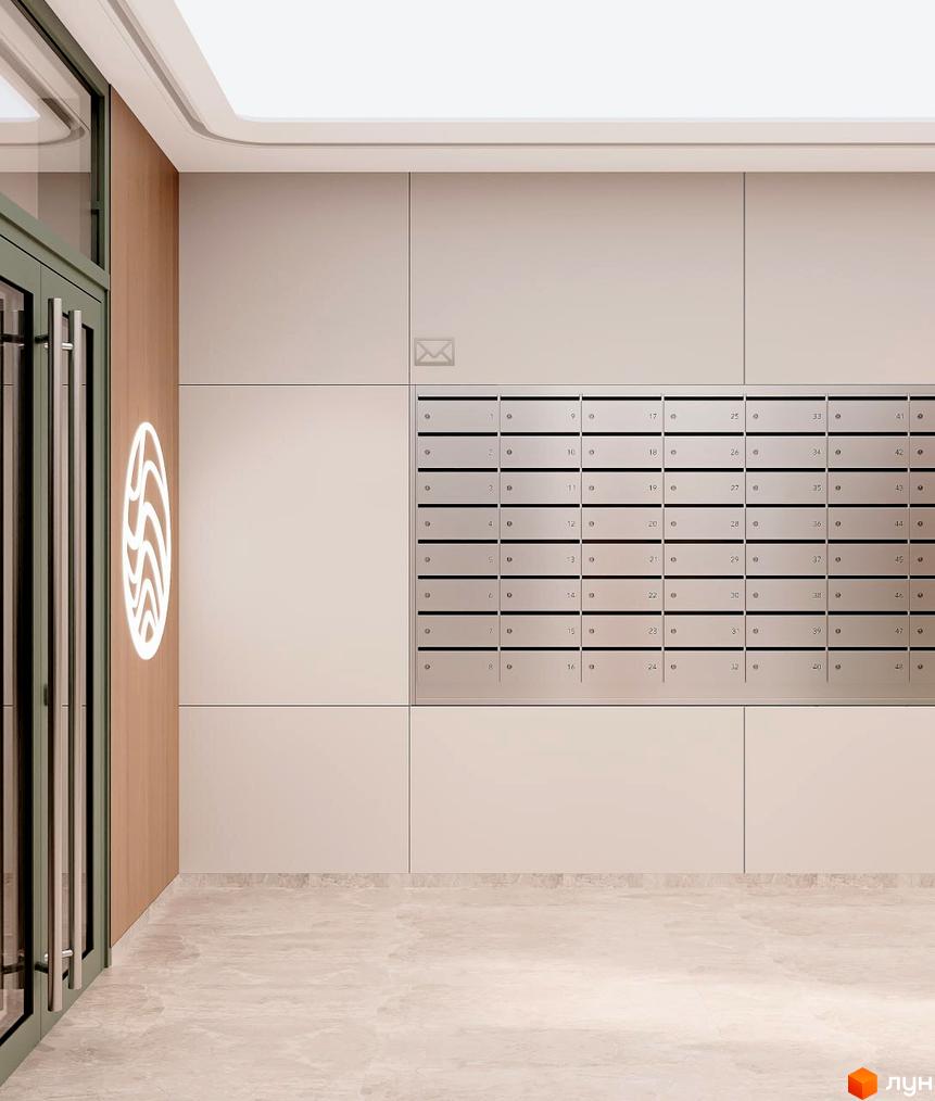 Вхідна група Житлового комплексу Медовий з поштовими скриньками, логотипом на дерев'яній панелі та світлою підлогою.