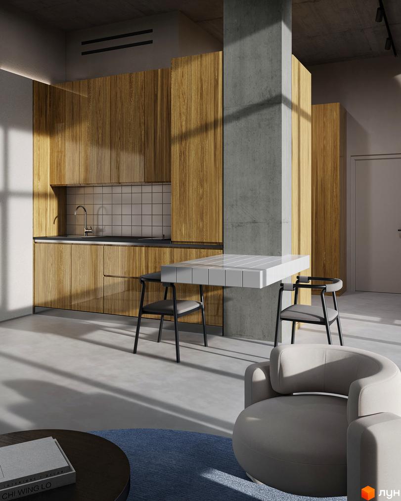 Інтер'єр квартири Circle hotel&apartments: кухня з дерев'яними шафами, обідня зона біля бетонної колони, вітальня з кріслом та килимом.