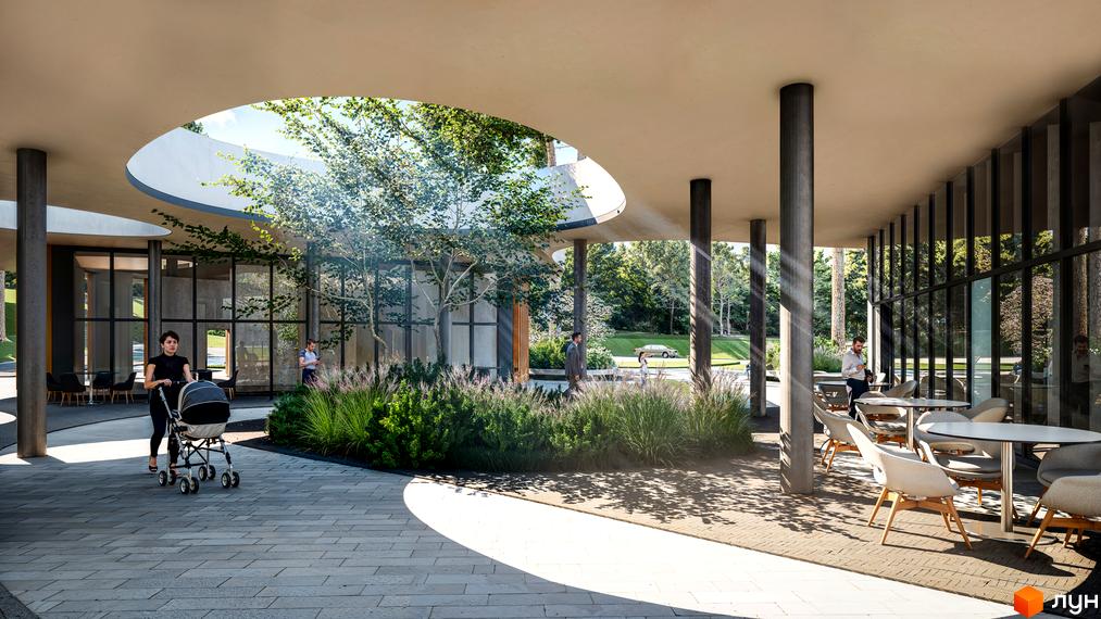 Житловий комплекс Gravity Park: будівля з округлим дахом, великими вікнами та внутрішнім двором з деревами, кафе та пішохідними доріжками.