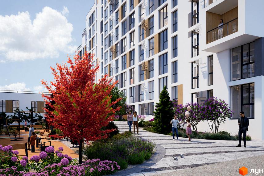 Житловий комплекс ЯРОВИЦЯ: багатоповерховий будинок з білими фасадами та великими вікнами. Облаштована прибудинкова територія з зеленими насадженнями та доріжками.