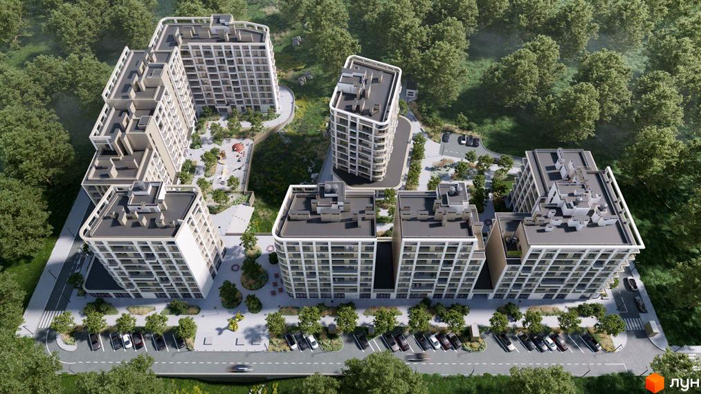 Житловий комплекс ШЕЛЕСТ: аерофотознімок будинків зі світлими фасадами та округлими формами, розташованих серед лісу з парковками та дитячими майданчиками.