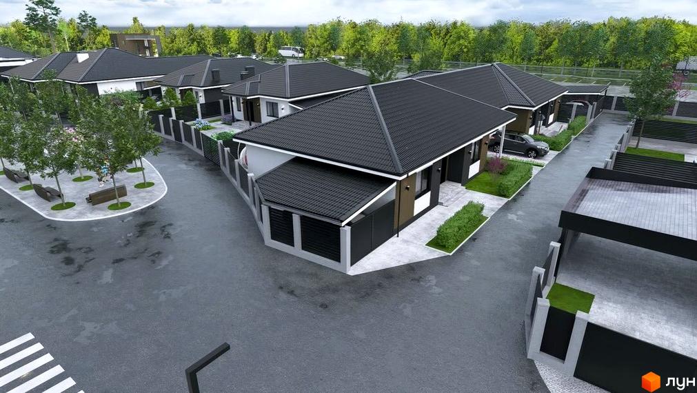 Зовнішній вигляд котеджного містечка КМ Beverly Hills з сучасними будинками та облаштованою прибудинковою територією.