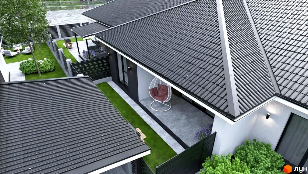 Зовнішній вигляд будинку КМ Beverly Hills з сучасним дахом та прибудинковою територією з зеленими насадженнями.