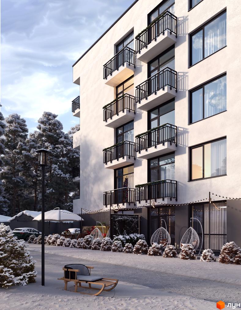 Фасад житлового комплексу Грінвуд-4 з балконами та великими вікнами. Прибудинкова територія з зимовим ландшафтом і елементами відпочинку.