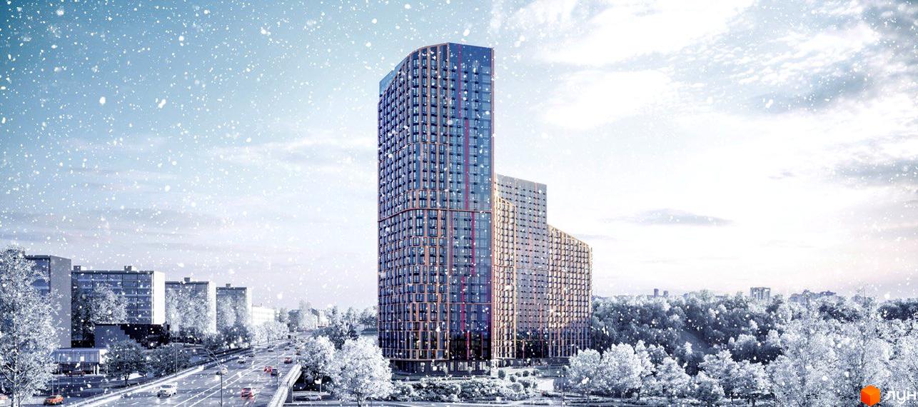 Житловий комплекс SALUT! з сучасним фасадом на фоні зимового пейзажу та зеленими насадженнями навколо.