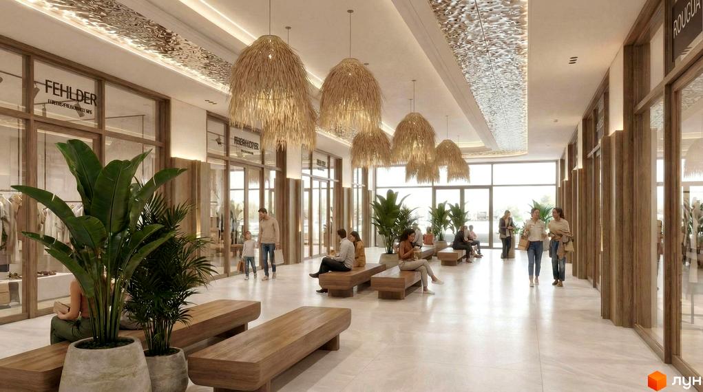 Сучасний інтер'єр Апарт-готелю PHOENIX PLAZA з дерев'яними меблями та рослинами. Простора зона відпочинку з великими вікнами.