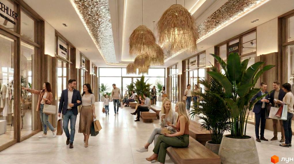 Інтер'єр апарт-готелю PHOENIX PLAZA з магазинами та зонами відпочинку. Просторий коридор з рослинами та стильними освітлювальними елементами.