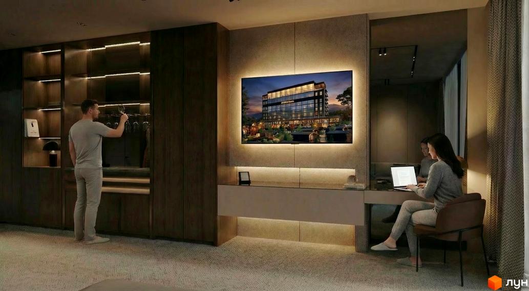 Інтер'єр апарт-готелю PHOENIX PLAZA з сучасними меблями та зручним робочим місцем. Вид на стильний елемент декору з зображенням комплексу.