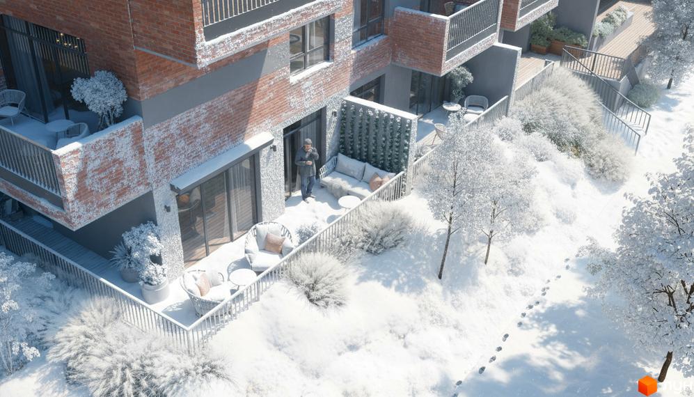 Зовнішній вигляд житлового комплексу Greenville Prostir з балконами та прибудинковою територією, засніженою та озелененою.