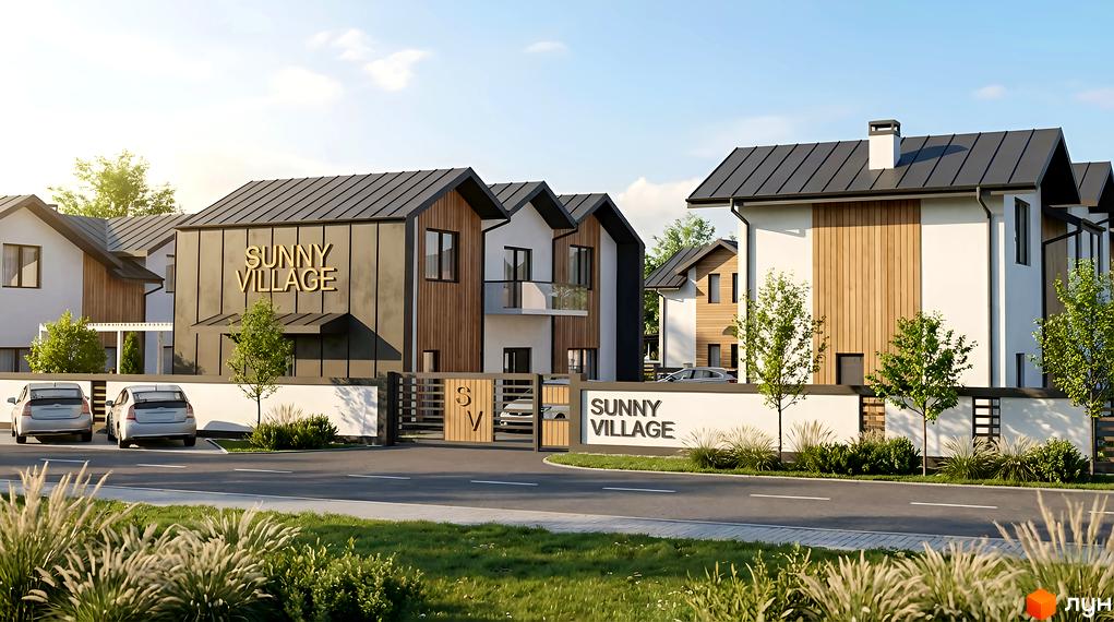 Зовнішній вигляд житлового комплексу Sunny Village з котеджами та прибудинковою територією. Видно паркувальні місця та зелені насадження.