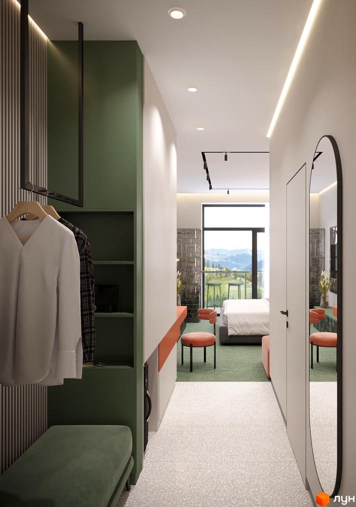 Сучасний інтер'єр апартаментів KARDAMON LIFESTYLE RESORT & SPA з просторим коридором та зоною відпочинку.