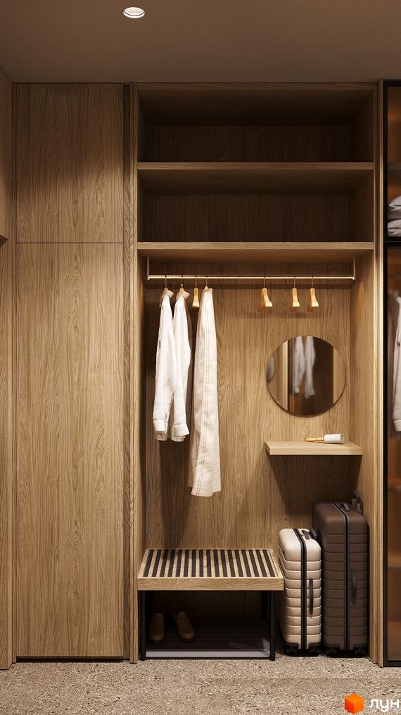 Сучасний інтер'єр передпокою з дерев'яними елементами та дзеркалом. Вішалка для одягу та місце для валіз.