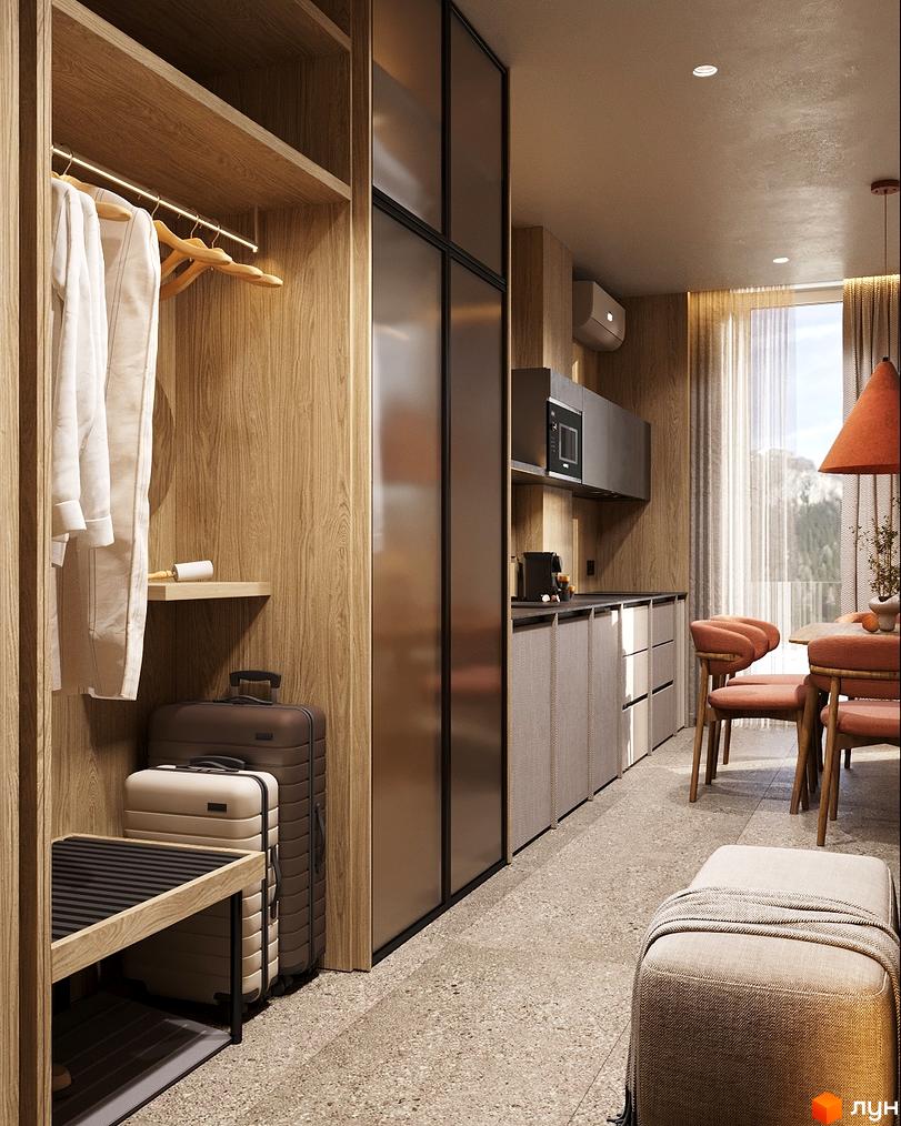 Сучасна кухня у квартирі ЖК Logos Home Apartment з дерев'яними елементами та м'якими меблями. Приємна атмосфера для комфортного проживання.