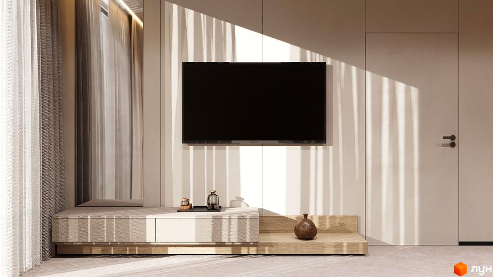 Інтер'єр квартири в ЖК Logos Home Apartment з телевізором на стіні та стильними меблями. Природне освітлення створює затишну атмосферу.